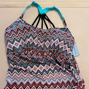 Bathing suit top, mixed colors, never worn, tag still attached in photo.